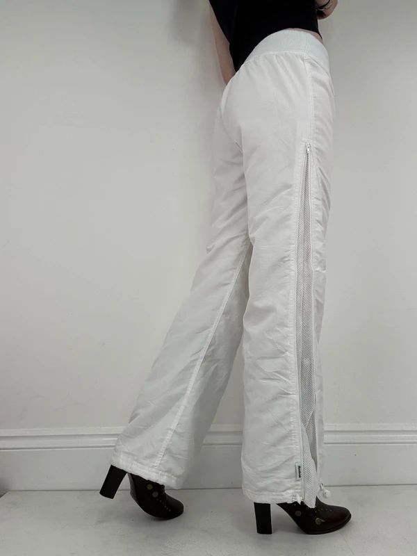 low rise white Reebok tracksuit bottoms