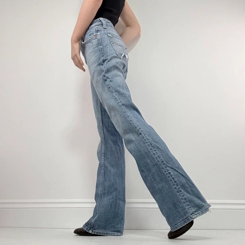 distressed flared leg low rise jeans