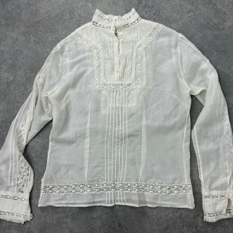 white pleated lace blouse