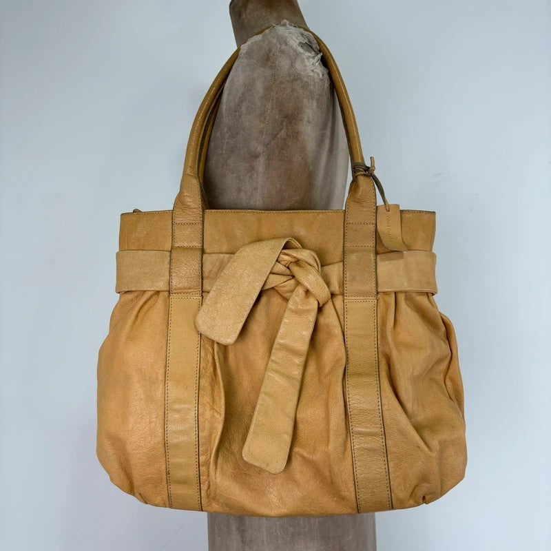 Cream yellow leather knot pleated handbag