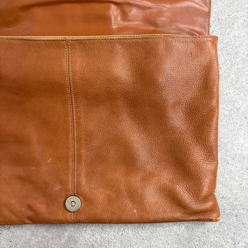 tan lather piercing punky silver hardware clutch bag
