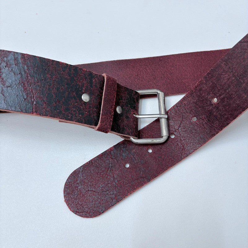 Distressed burgundy red leather belt
