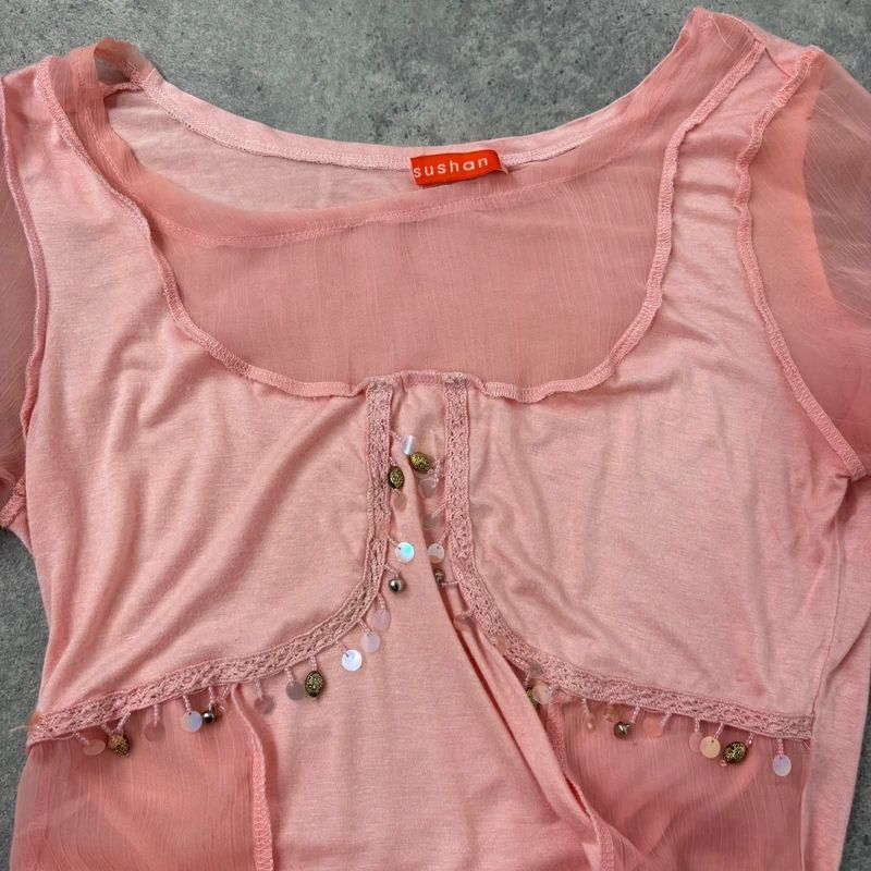 pink flared long sleeve t-shirt