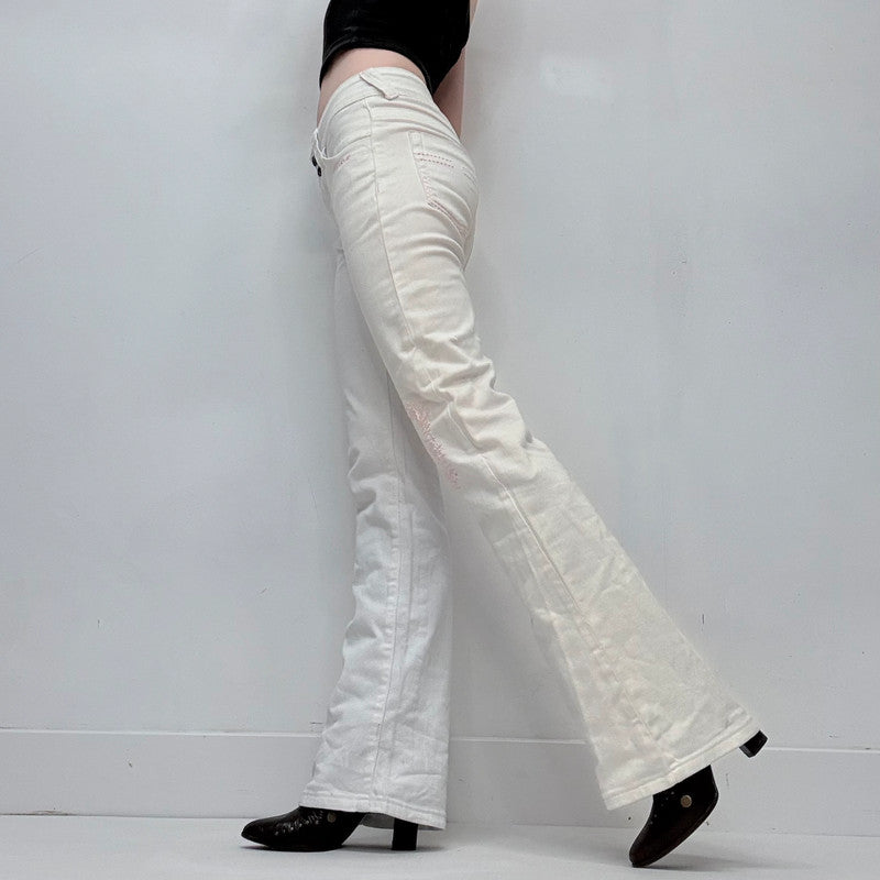white low rise distressed stitched jeans