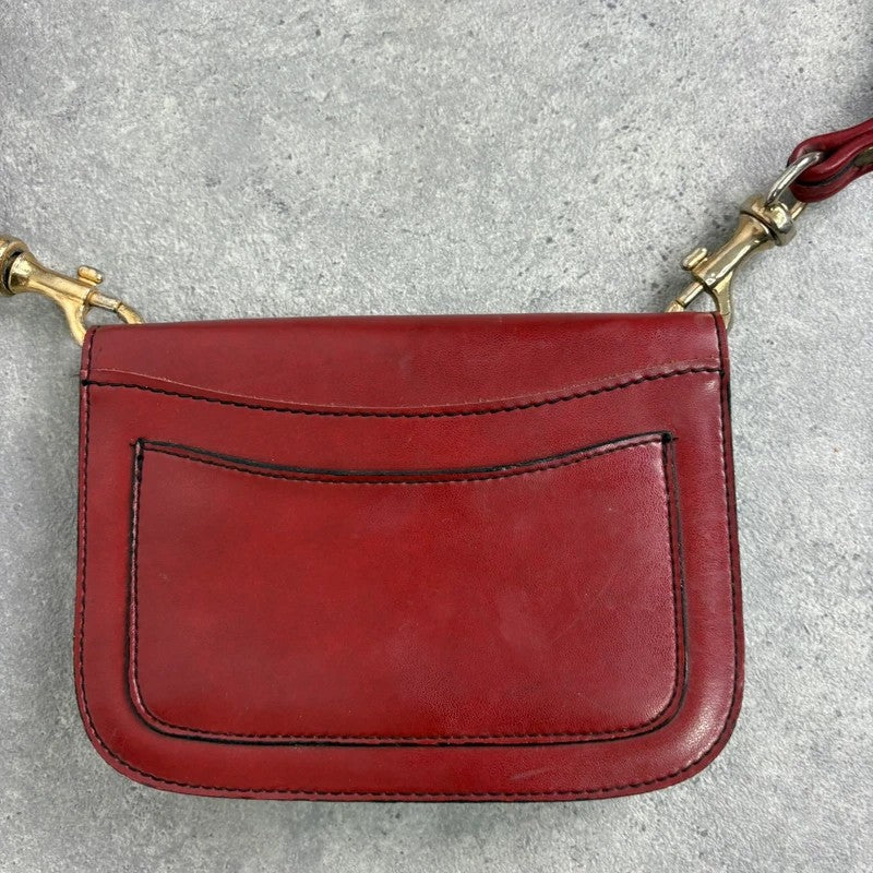 Red leather minimalistic shoulder handbag