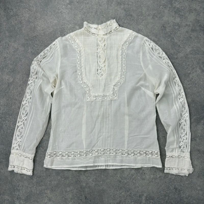 white pleated lace blouse