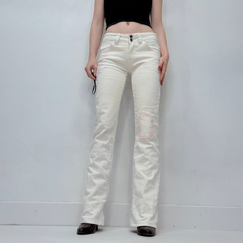 white low rise distressed stitched jeans