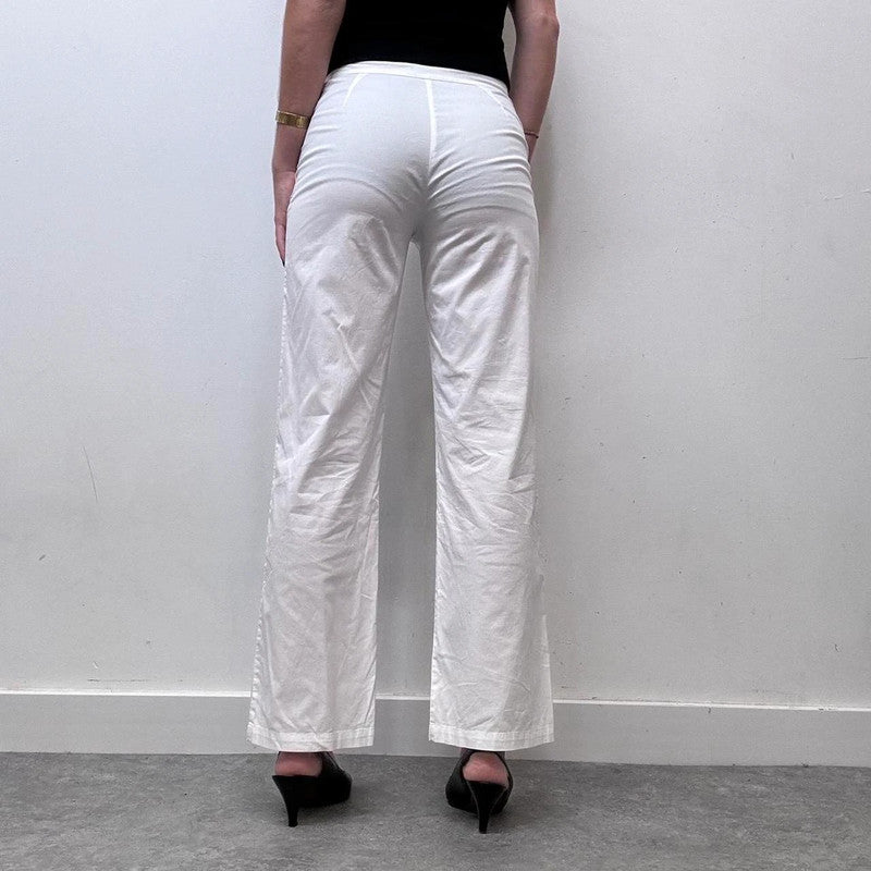 white minimalist flared trousers