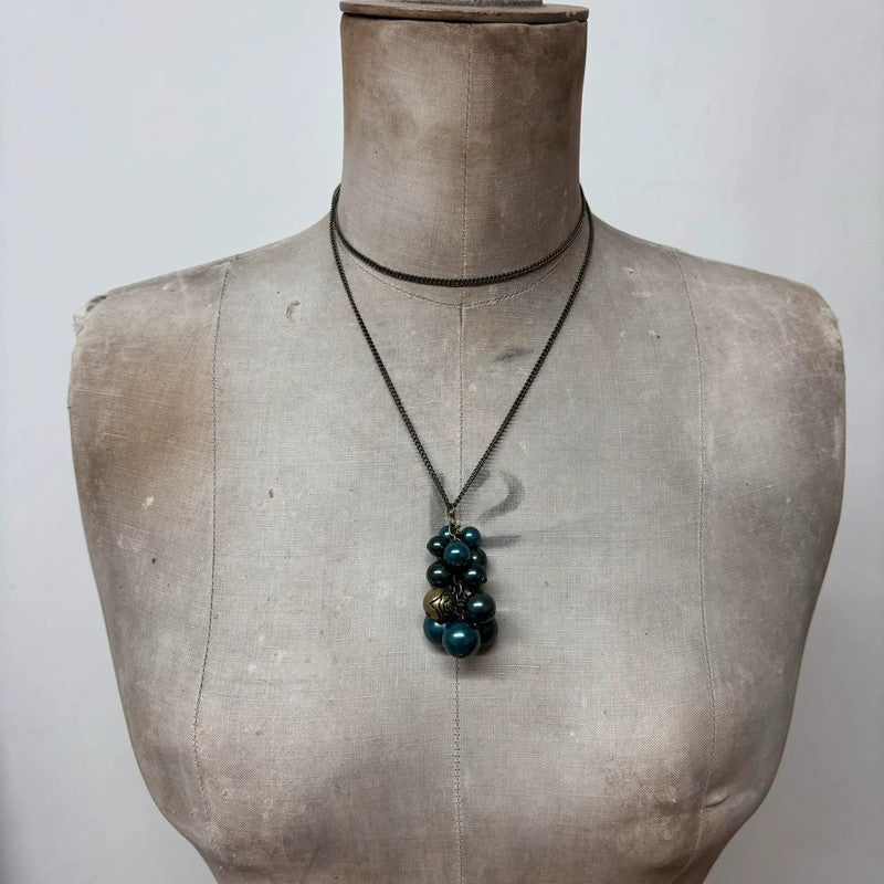 charm necklace hanging beads