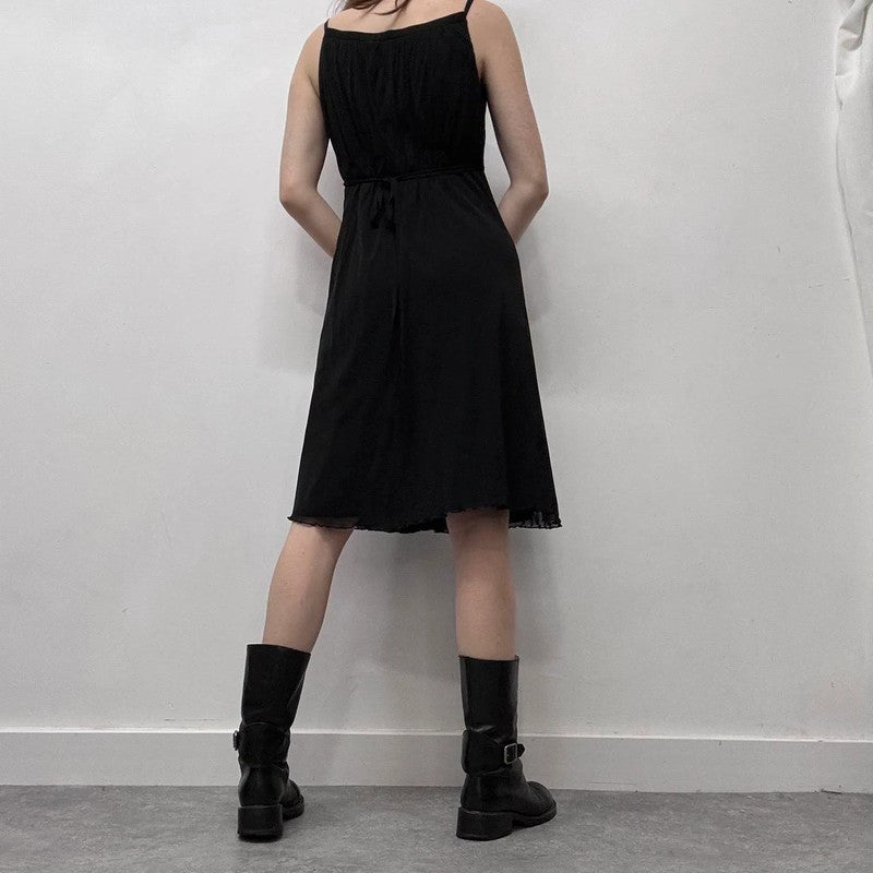 black pleated cinched mini dress